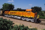 BNSF 7767, GE ES44DC (GEVO), Brand New DPU unit on the rear of a westbound hopper train